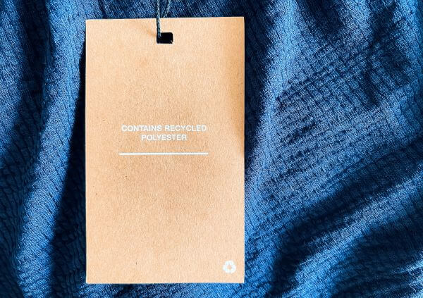 Clothing Material: Types Of Fabric And Their Uses 2 A polyester label on a garment