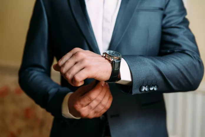 wrist couture, man wearing a watch