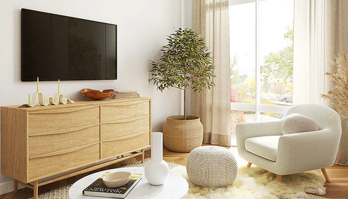 Le salon est décoré de blanc naturel et de bois clair